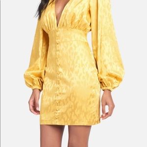 Bebe Ballon sleeve jacquard dress. Plunging neckline.